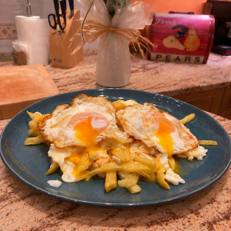 Huevos rotos con patatas a domicilio en Madrid | Asador PanXon